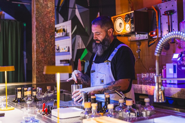 Jorge Overall preparing a cocktail by Pete